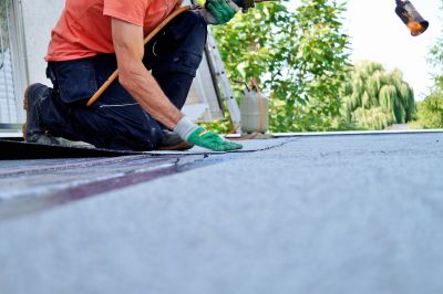 Preparing roofing materials outdoors